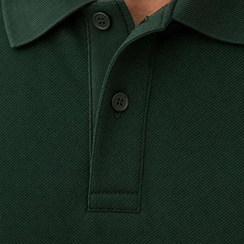 Custom button placket detail on a printed polo shirt