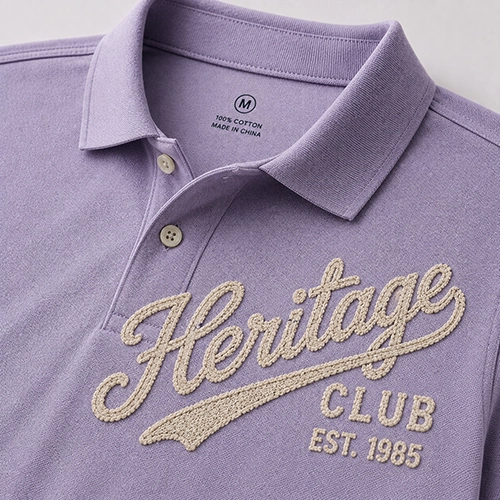 Chain stitch embroidery detail for a custom polo shirt